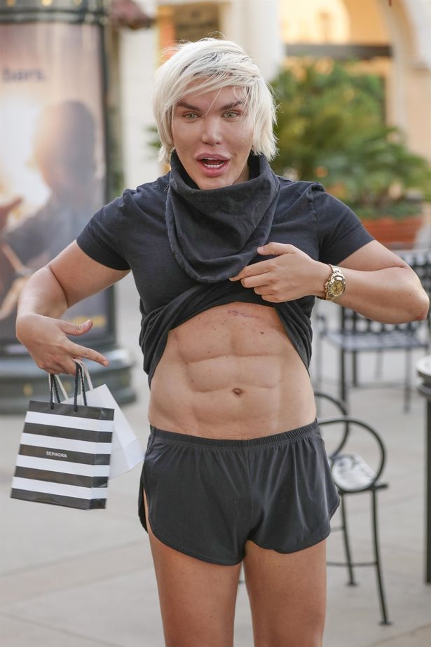 Human Ken Doll, Rodrigo Alves Shows Off His $29k Fake Abs. (Photos)