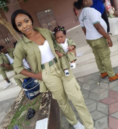 Female NYSC Member Melt Hearts Online as She Poses with Her Little Daughter in Matching Uniforms (Photos)