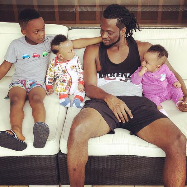 Paul Okoye shares cute family photo with his twins and son.