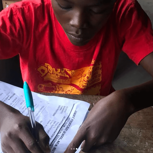 Plantain seller who was photoed hawking in the middle of the night gets enrolled in a private school after passing entrance exam (Photos)