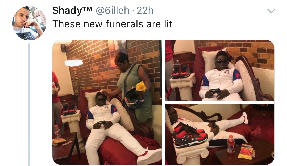 Dead man made to sit like he is playing Video game during his burial (Photos)