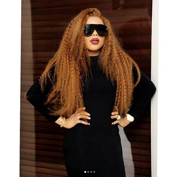 Bobrisky flaunts his curves in black body-hugging dress (Photos)