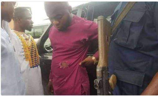 Trending photos of Anambra bulletproof Pastor, Elijah, flaunting bundles of naira before he was 'shot'.