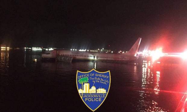 Plane skids off runway, falls into river in Florida