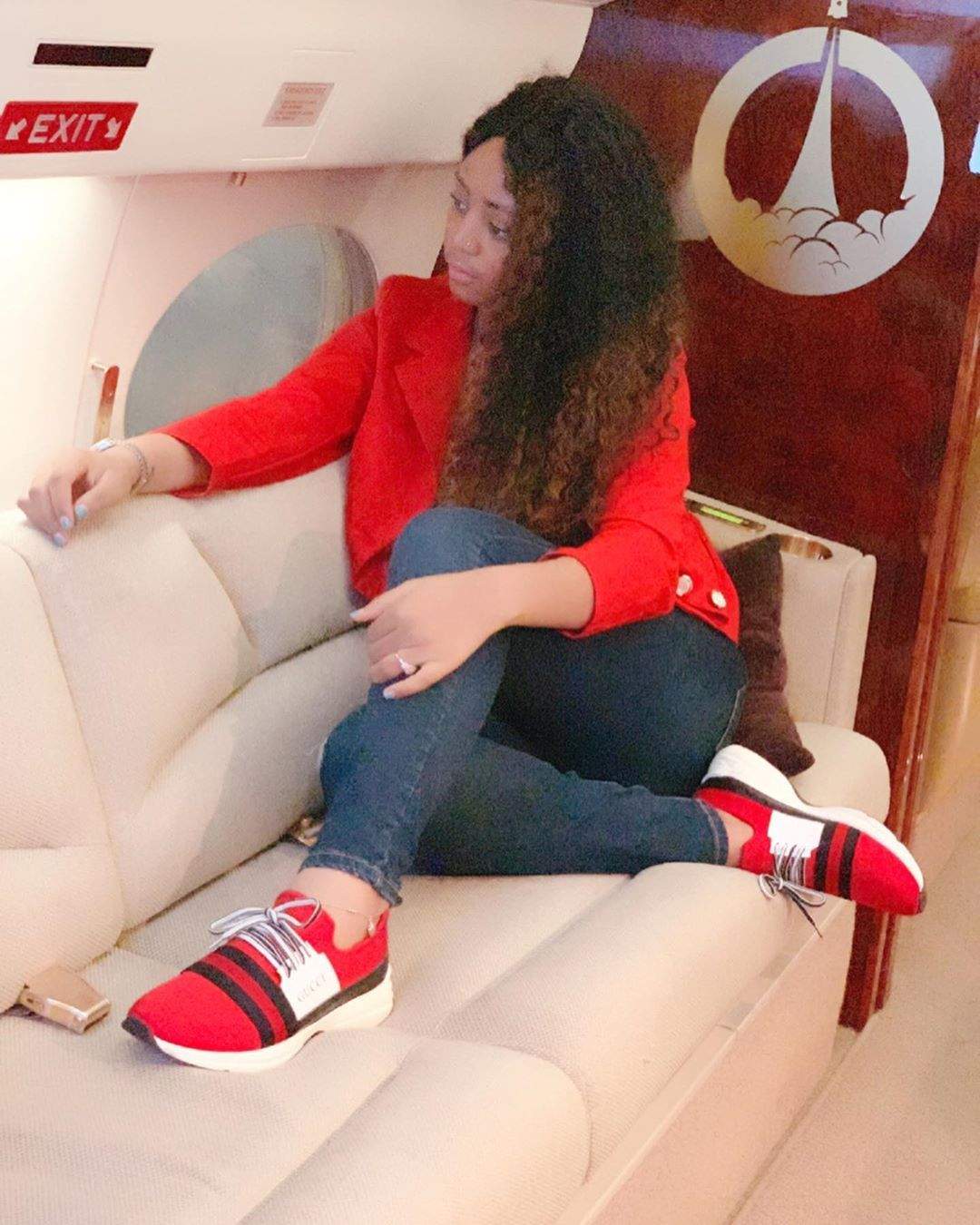 Regina Daniels jets out with her stepchildren for vacation (Photos)