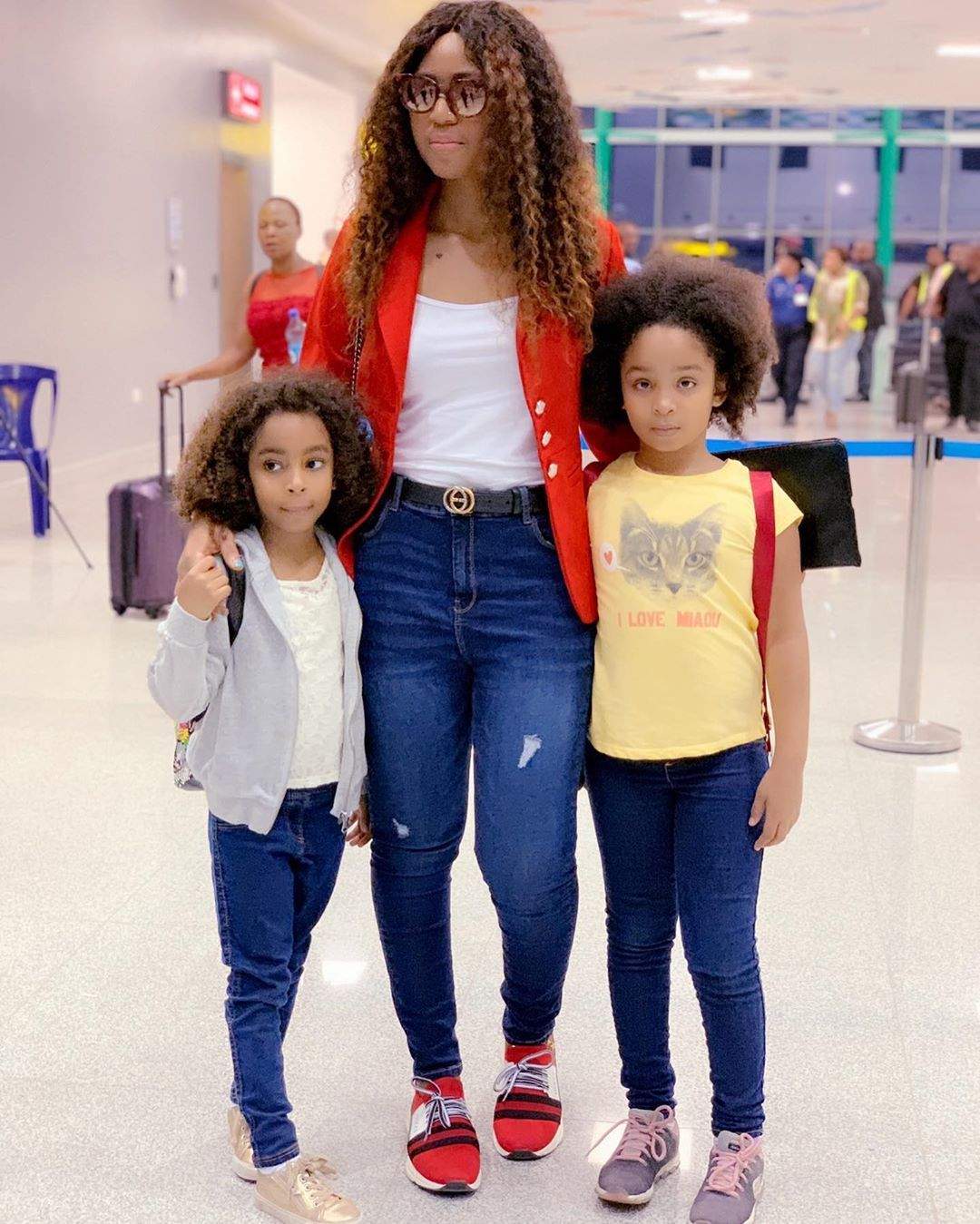 Regina Daniels jets out with her stepchildren for vacation (Photos)