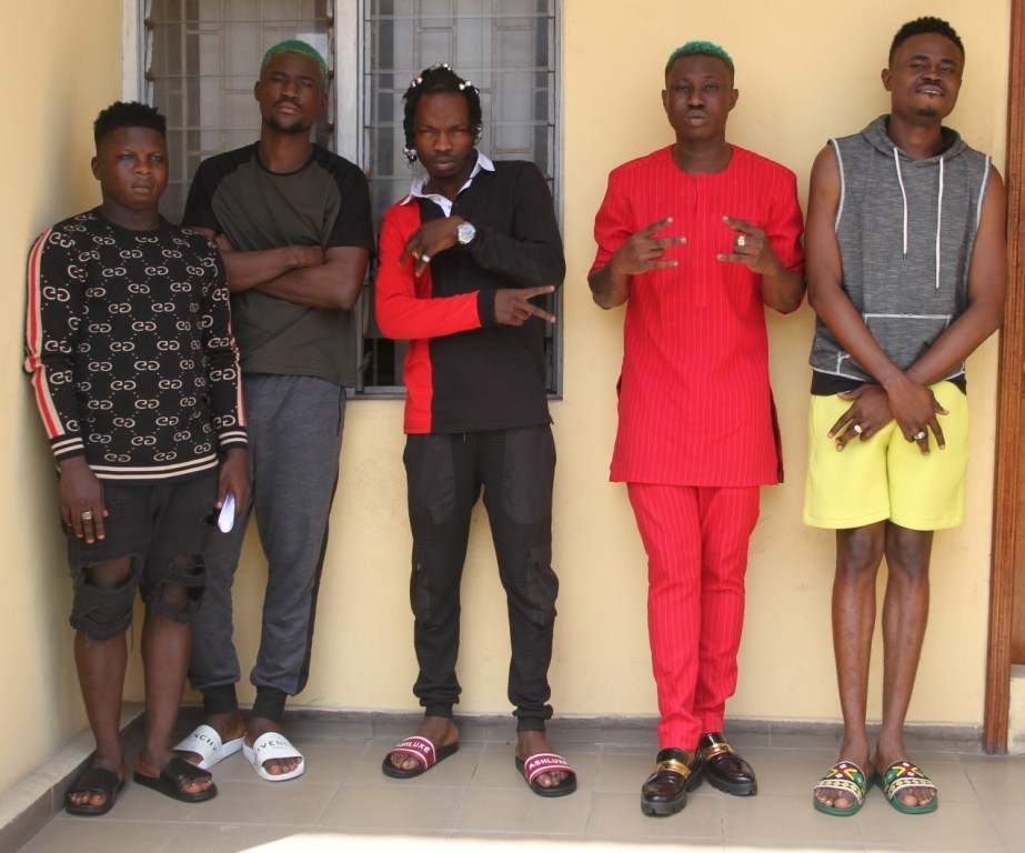 Naira Marley Recreates EFCC Mugshot With Crew