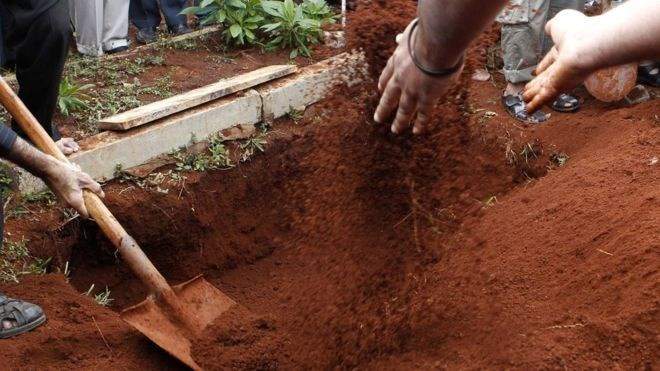 Kenyan officials exhume dead officer's body to retrieve uniform