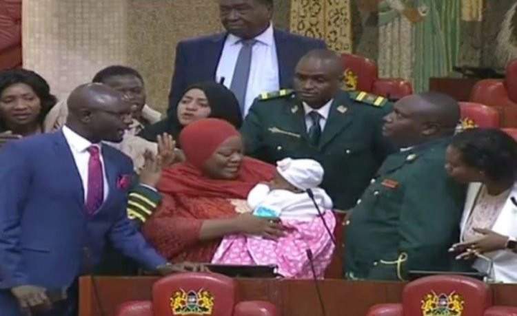 Drama as lawmaker is kicked out of Parliament for bringing her baby to the chambers (video)