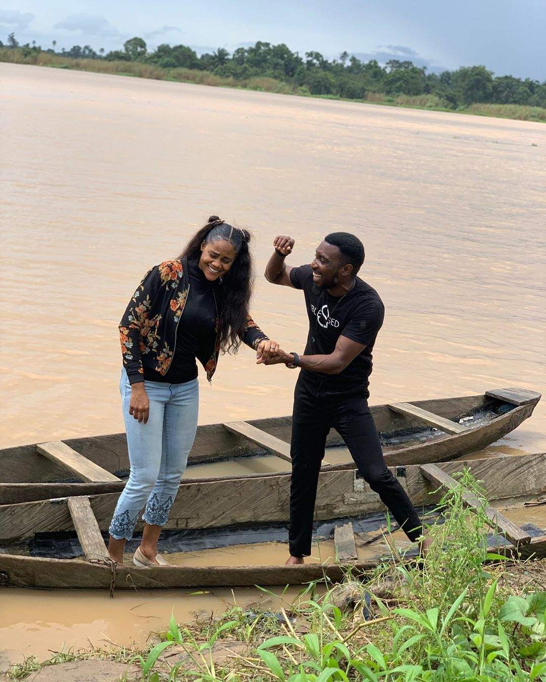 Lovely photos of Timi Dakolo and his wife, Busola enjoying a boat ride in Bayelsa