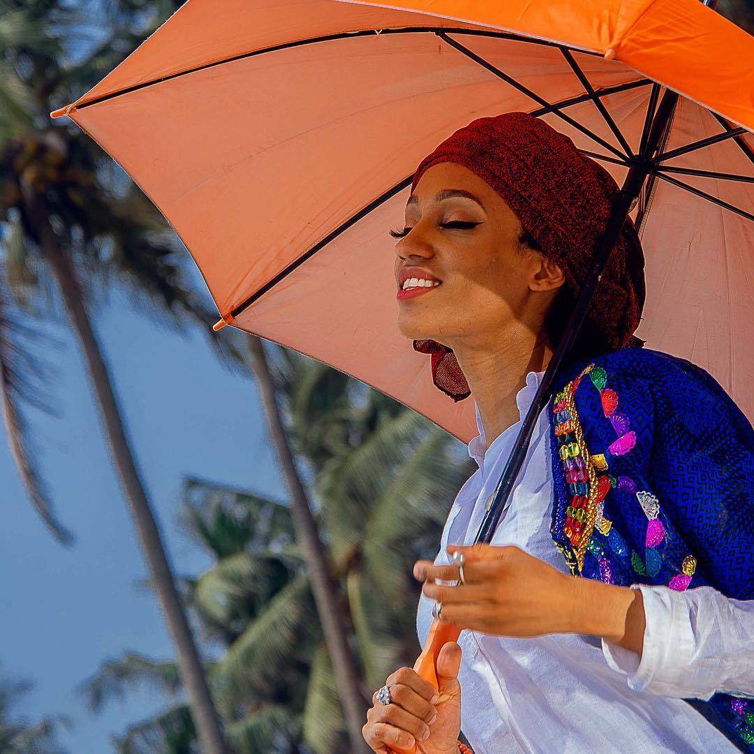 'Partner in everything' - Di'Ja says she shares rare photos of herself with her husband enjoying a stroll at the beach