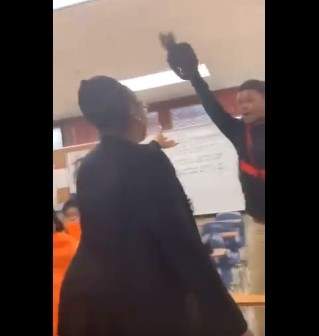 Student snatches his teacher's wig in front of classmates (video)