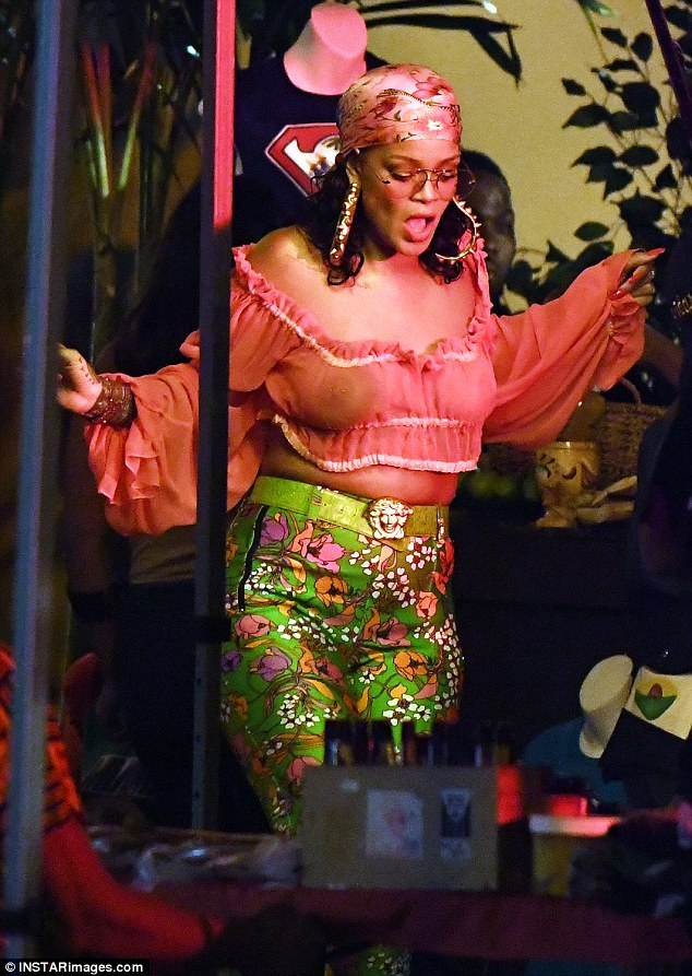 Rihanna Flashes N!pple Piercing In Sheer Top