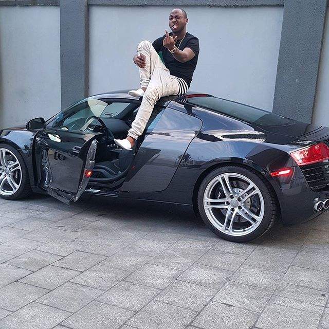 Davido poses with his Audi R8