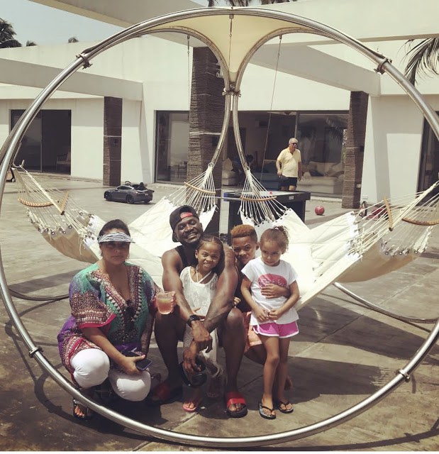 Lovely photos of Peter Okoye and His family as they hang out at a beach in Lagos