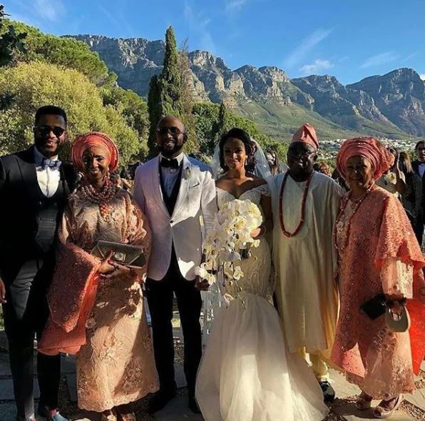 From Left: Tosin Etomi, Adesua's Mom, Eniiwaju Etomi, the couple and Banky W parents.