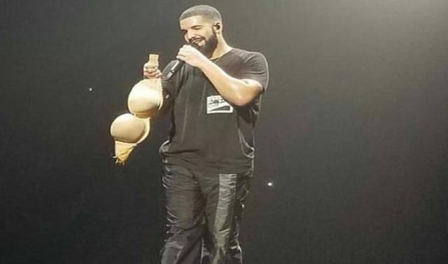 Watch Drake's Reaction After A Female Fan Threw Her Bra At Him While He Was Performing On Stage. (Video)