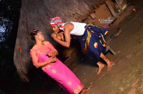 Drunk-In-Love Man Climbs Palm Tree To Profess Love To His Fiancee In Village-Themed Pre-wedding Photos