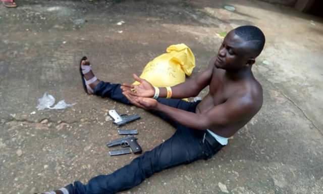 Man Nabbed At Obudu Motor Park With Pistols And Magazines Buried In A Bag Of Garri (Photos)