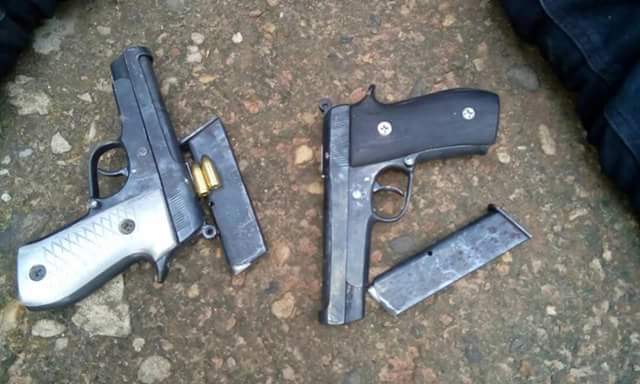 Man Nabbed At Obudu Motor Park With Pistols And Magazines Buried In A Bag Of Garri (Photos)