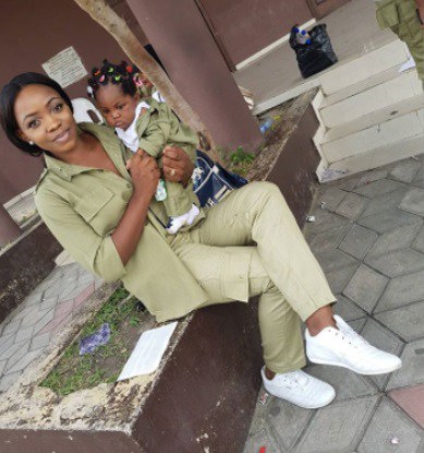 Female NYSC Member Melt Hearts Online as She Poses with Her Little Daughter in Matching Uniforms (Photos)