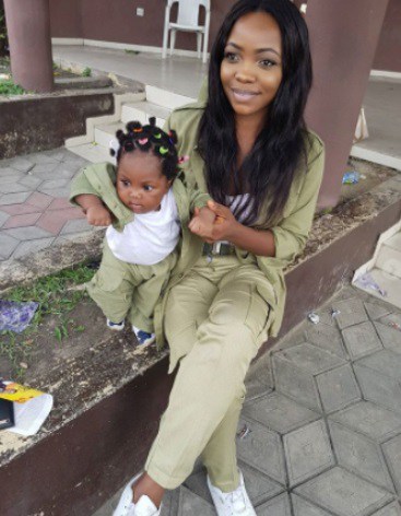 Female NYSC Member Melt Hearts Online as She Poses with Her Little Daughter in Matching Uniforms (Photos)