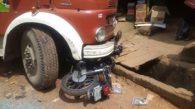Okada rider narrowly escapes death after truck driver crushed his motorcycle in Imo while allegedly being chased by soldiers (Photos)