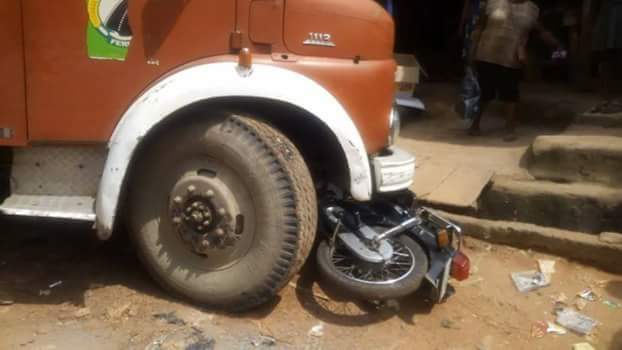 Okada rider narrowly escapes death after truck driver crushed his motorcycle in Imo while allegedly being chased by soldiers (Photos)