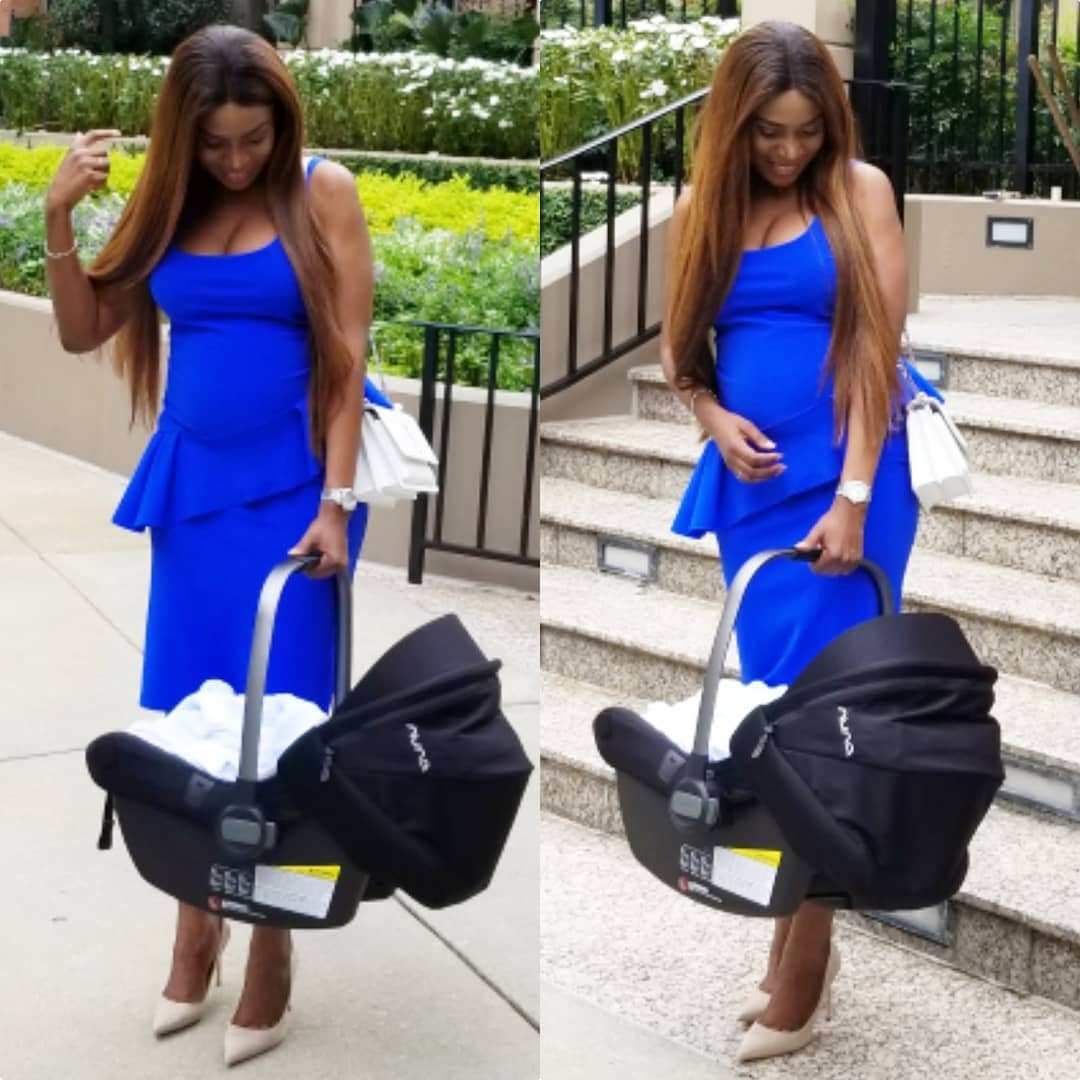 Linda Ikeji steps out with her son for the first time, shows off her post-baby bod