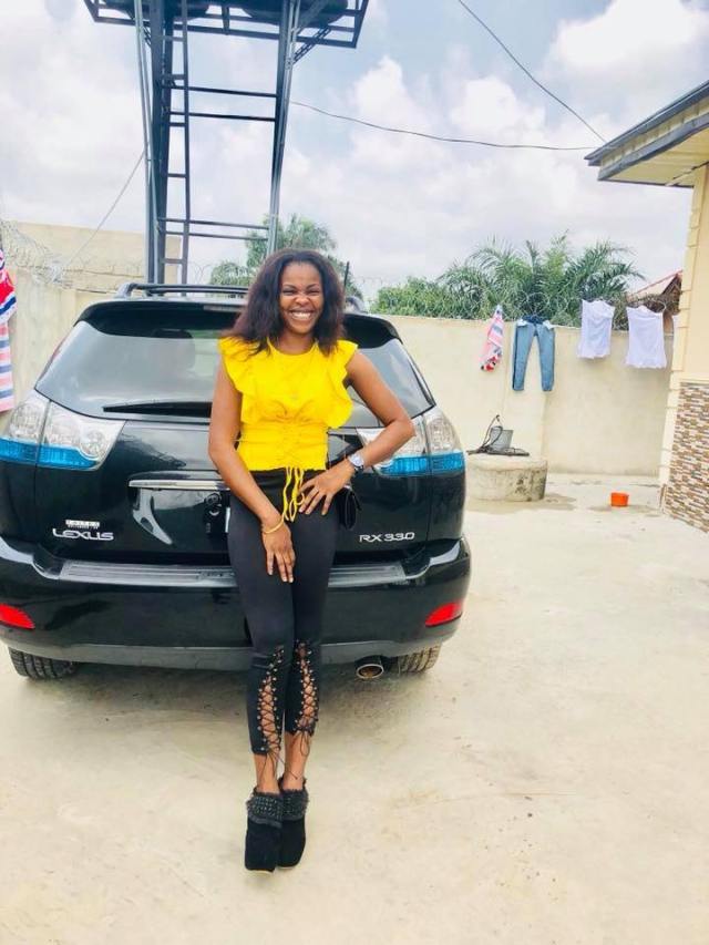 Nigerian Lady who does POP for a living acquires brand new lexus SUV