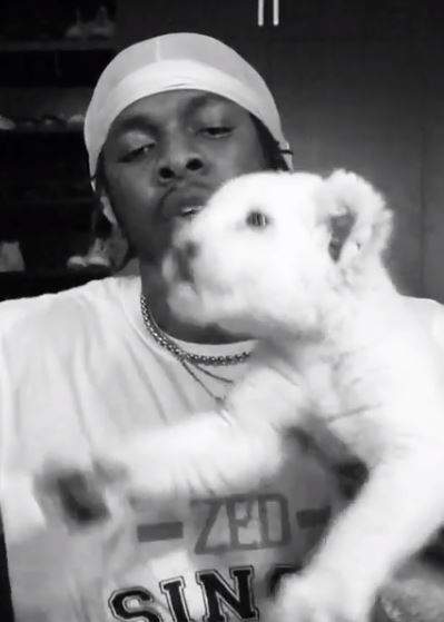 Singer, Runtown becomes owner of white pet lion (Photos)