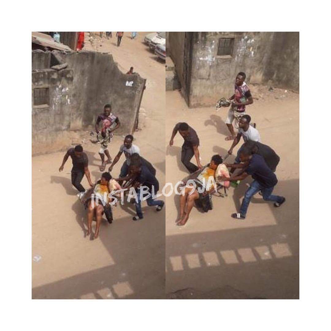 Lady drinks 'sniper' after fight with husband in Lagos (Photo)