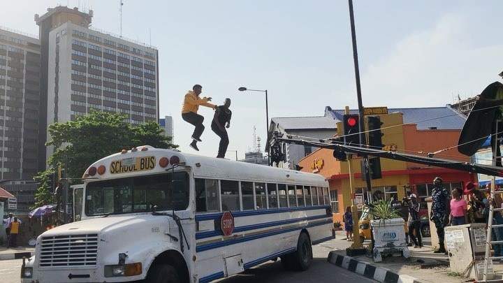 Dr Sid and Korede Bello nearly fell off the top of a bus