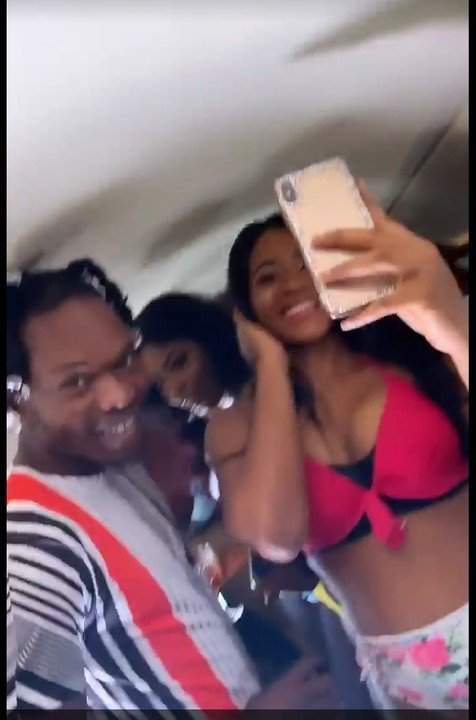 Naira Marley parties with bikini-clad ladies aboard Regina Nwoko's husband private jet