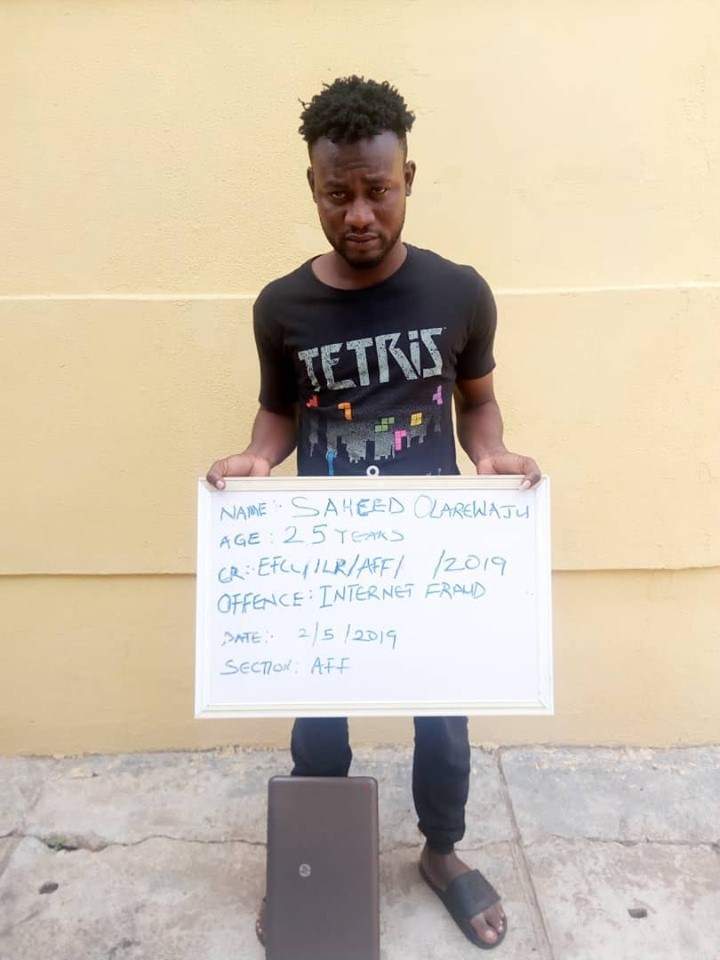 Two suspected internet fraudsters and their charms arraigned in court (photos)