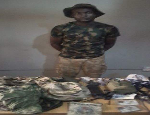 Robbery suspect who operates in 'army uniform' apprehended in Ogun State (Photo)