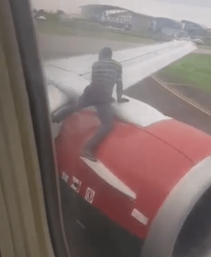 Panic as unknown man exits bush with a bag which he stuffs into the engine of a plane about to takeoff in MMIA (video)