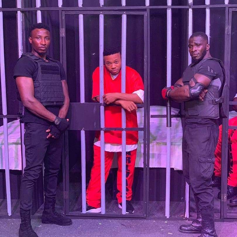 Naira Marley Recreates EFCC Mugshot With Crew