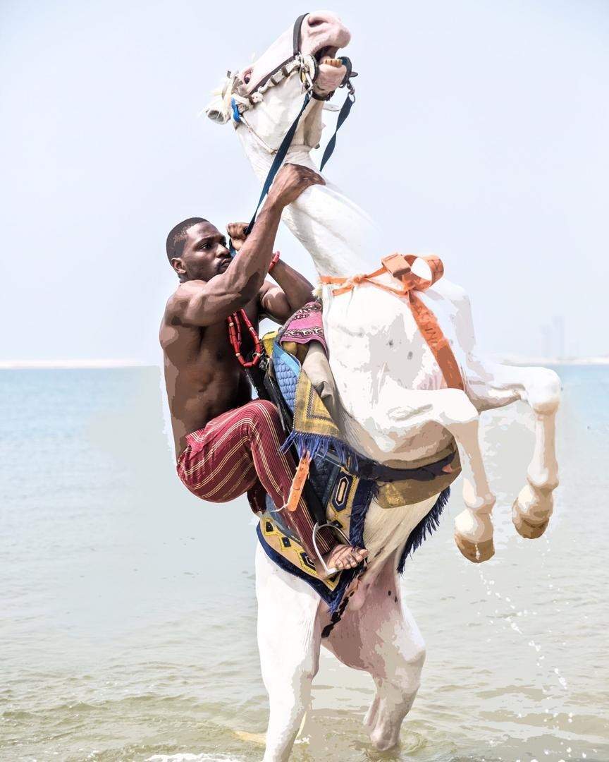 BBNaija's Tobi Bakre accused of animal cruelty after he held a horse's neck too tight during photoshoot