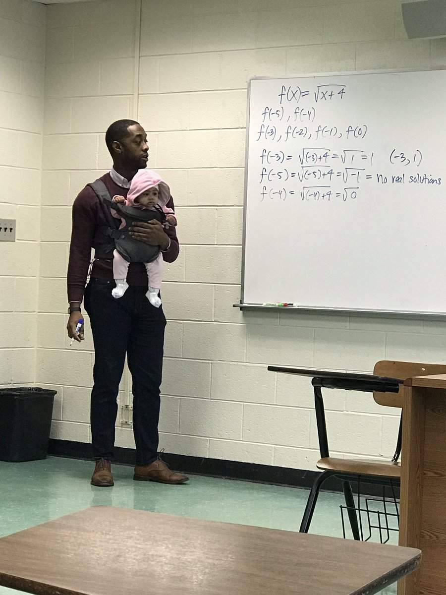 Professor helps student carry his baby during classes Professor helps student carry his baby during classes