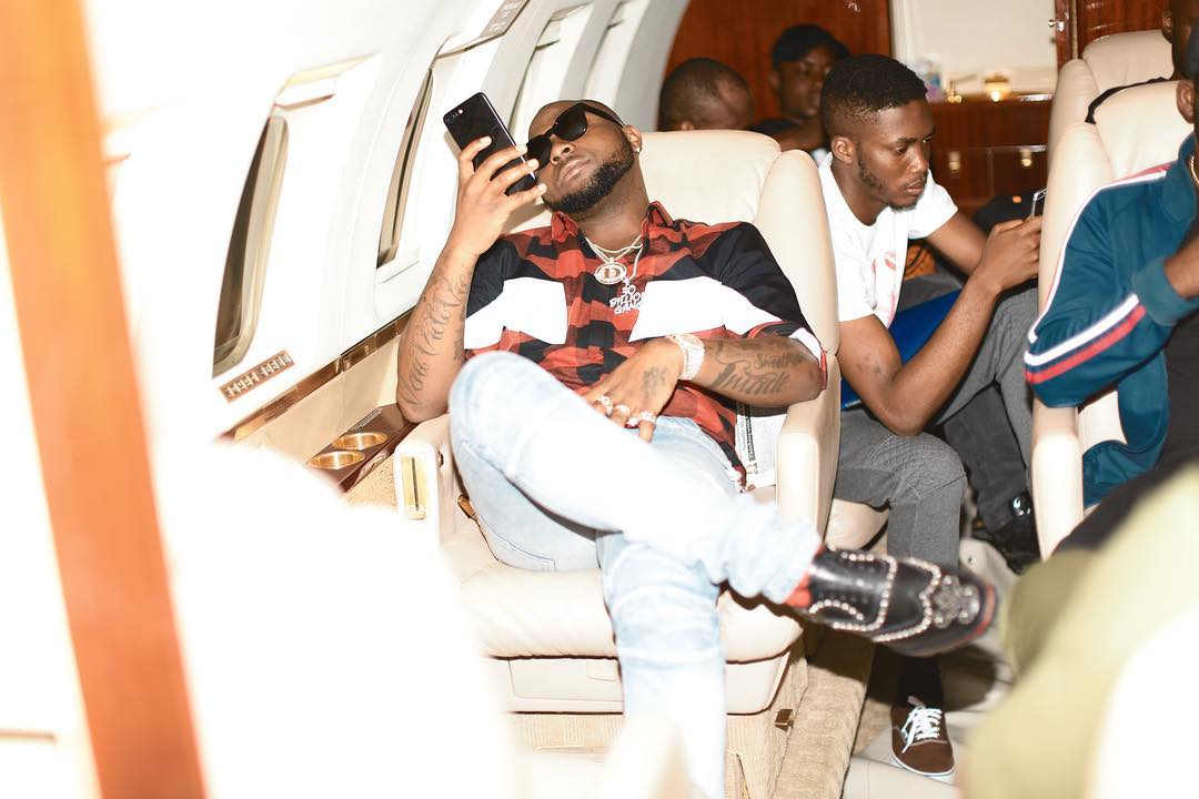 Davido Shows Off Expensive Shoes On Board Private Jet