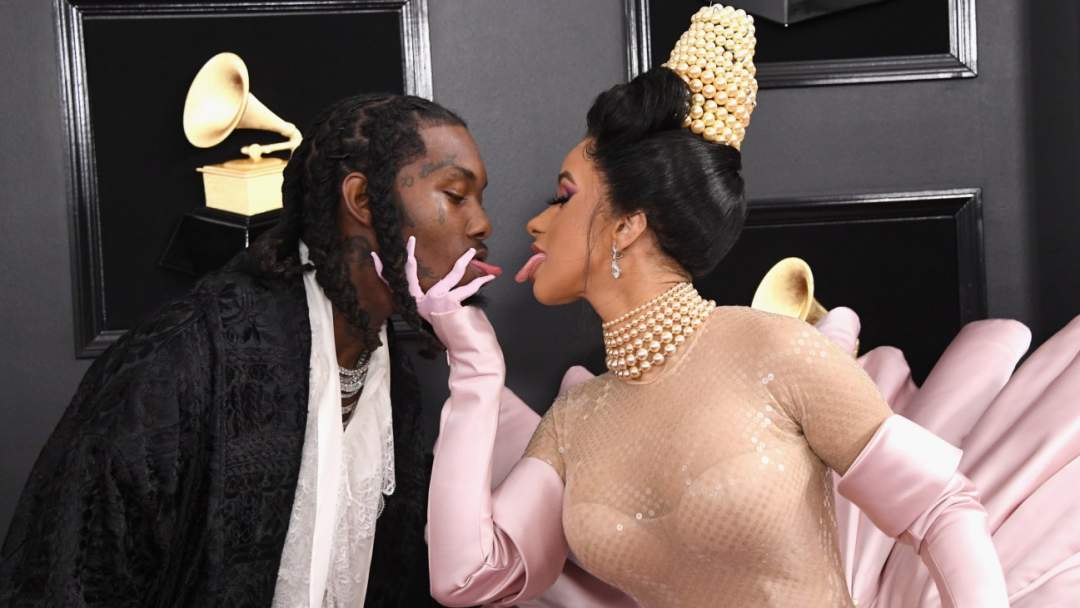 Cardi B and Offset kiss each other at the 2019 Grammy Awards