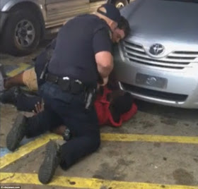 Photos: Black Man Shot 6 Times At Close Range By Police Sparks Protest In U.S