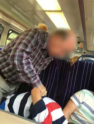 Man Puts Child In Armlock On A Train Because He Wouldn't Take His Feet Off The Seat