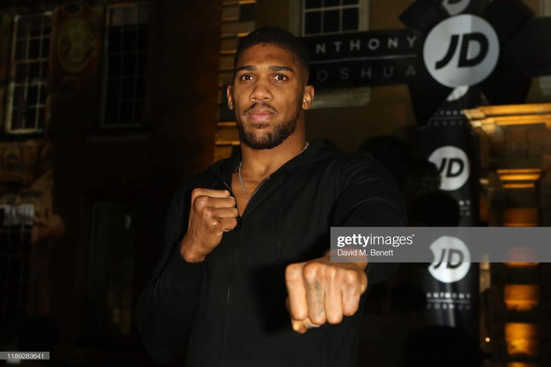 Anthony Joshua Attends The Jd Sports Christmas Party At Aynhoe Park Picture Id1189283641?s=28
