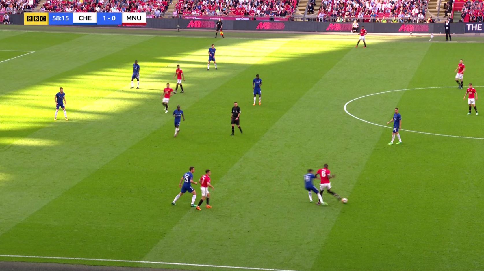 Pogba was forced to step in and fend off Cesc Fabregas. (BBC)