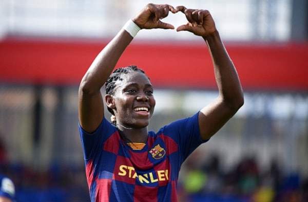 Barcelona striker Asisat Oshoala stuns fans, shows off new orange hairstyle (photos)