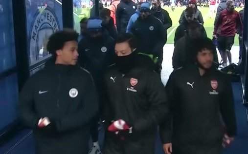 Out-of-favour Arsenal star spotted giving Man City winger incredible gift while his side suffered defeat at the Etihad