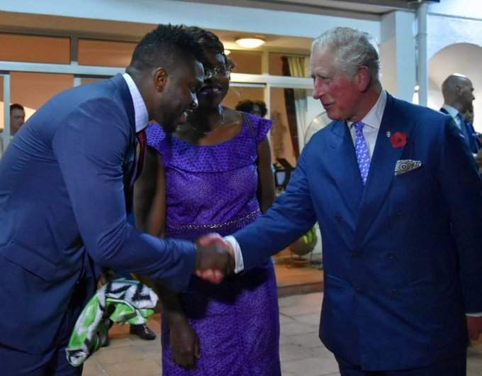 Former Super Eagles captain Joseph Yobo presents Prince Charles a Nigerian jersey (Photos)