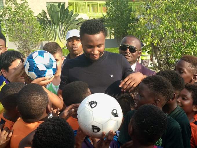 Checkout what Super Eagles captain Mikel was spotted doing with children in Lagos (photos)